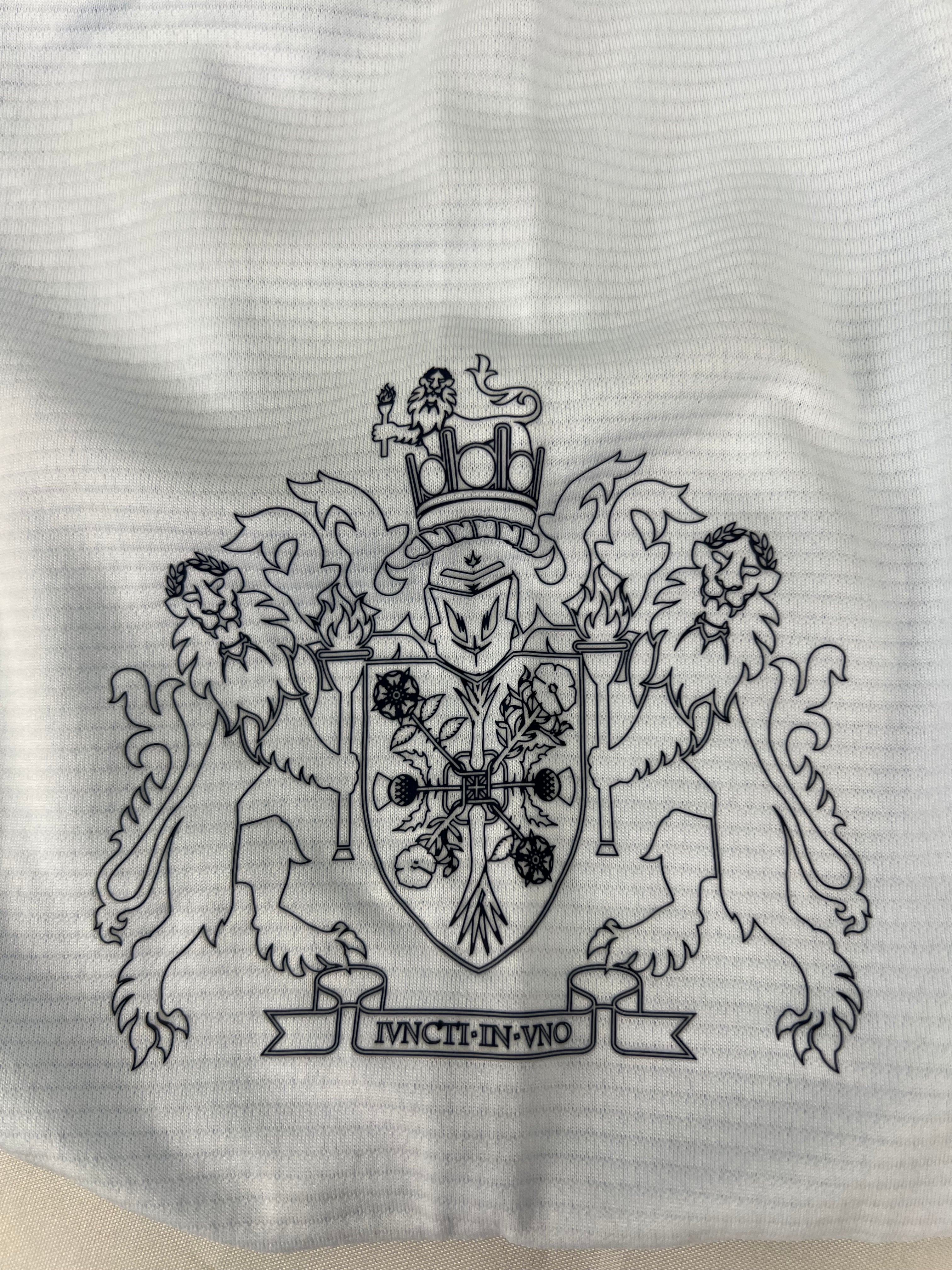 Close-up detail of the inside fabric crest design on adidas Team GB long sleeve top