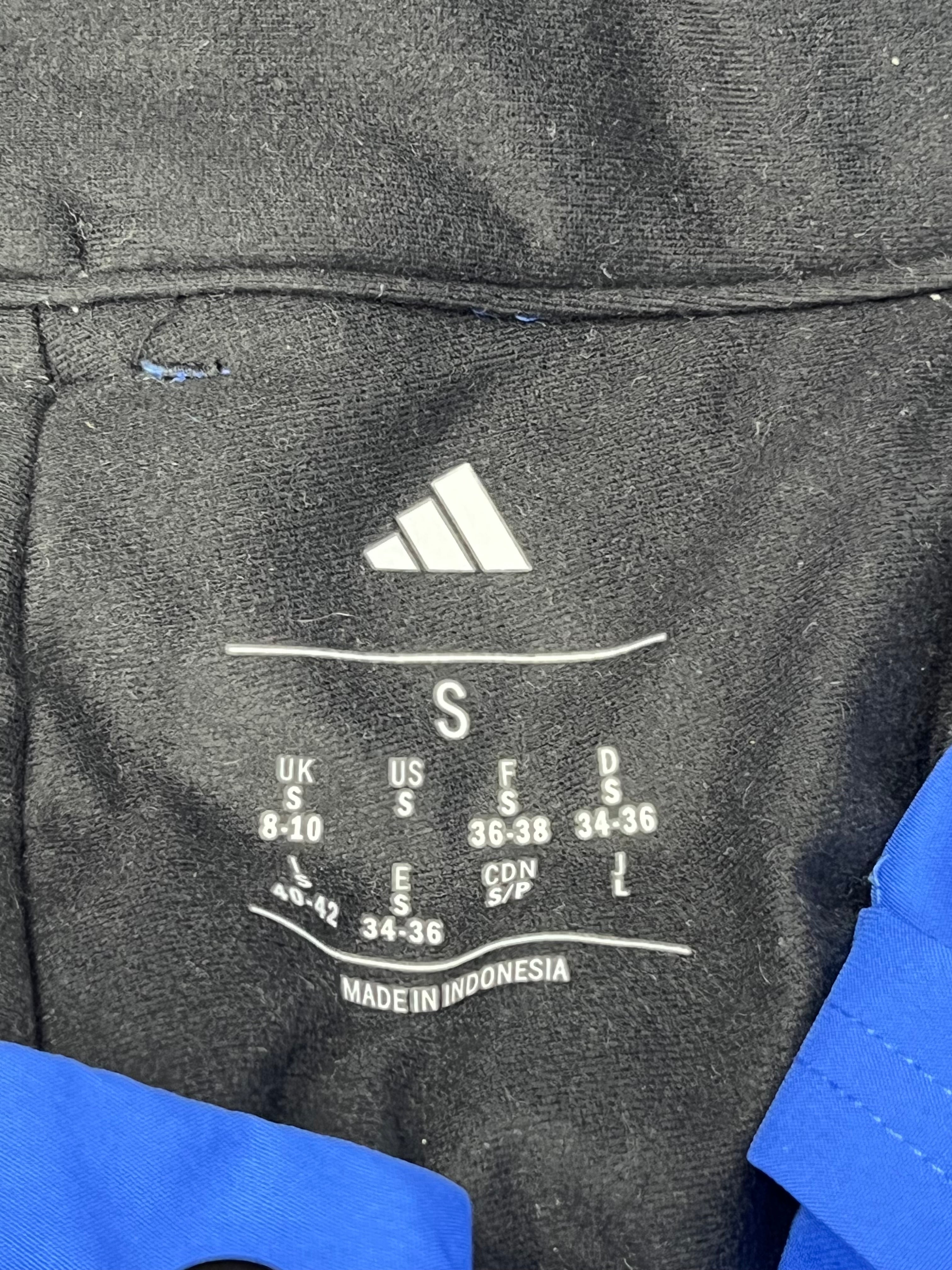 Tag showing size small and adidas logo printed inside the fleece lining
