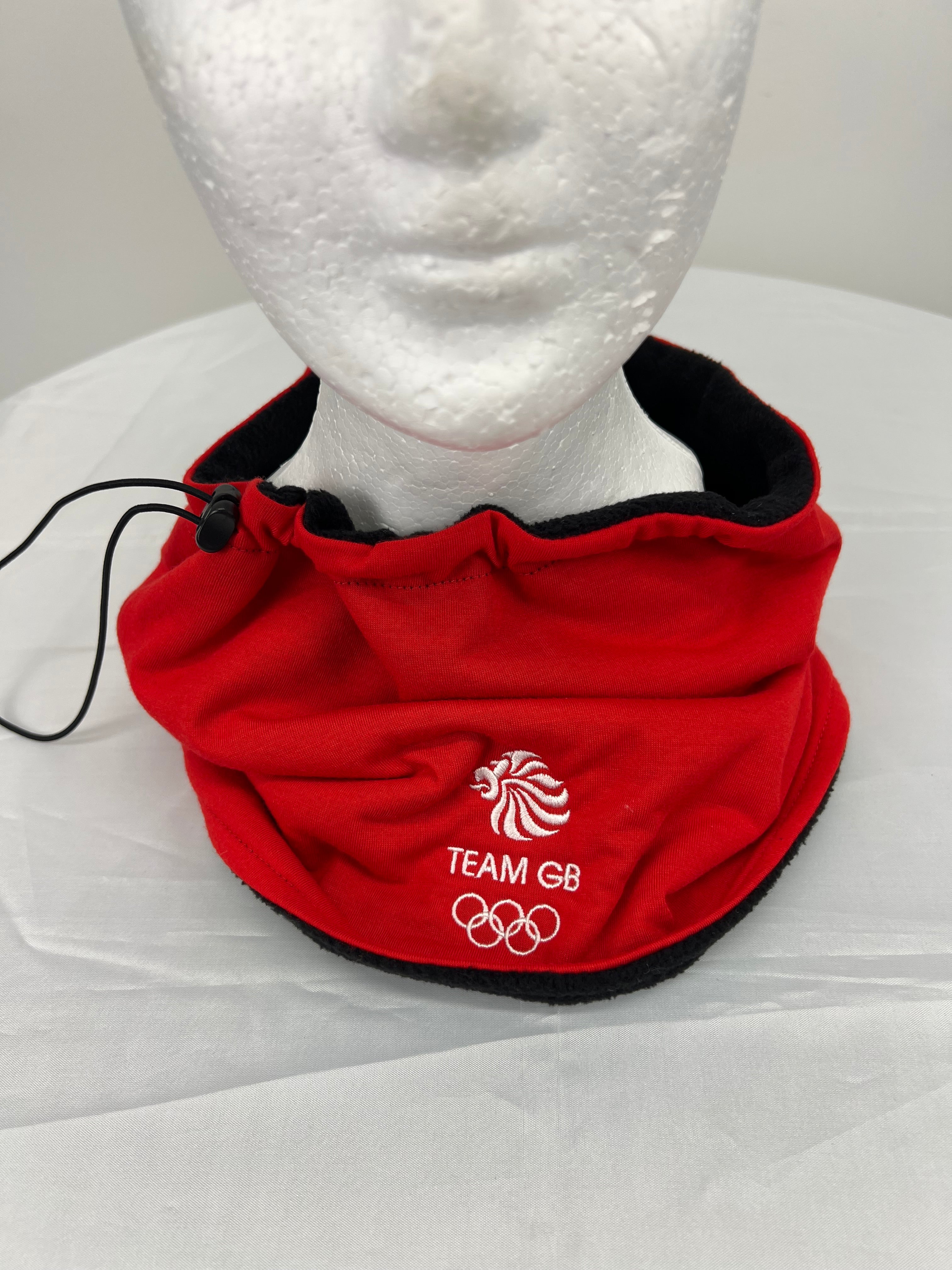 Red Team GB neck warmer worn on mannequin showing adjustable drawstring