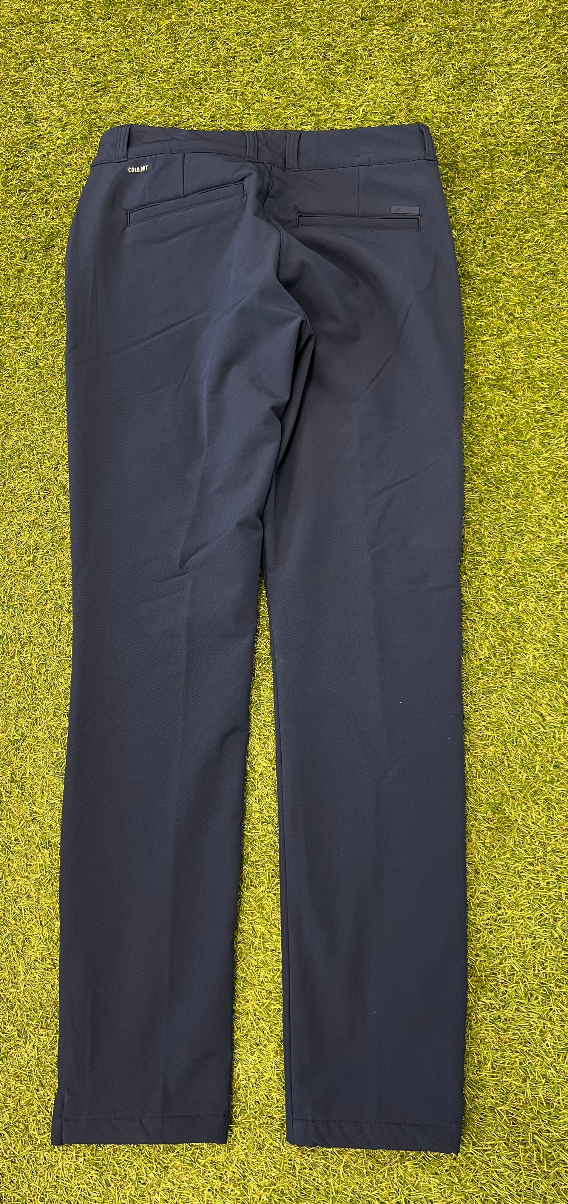 Adidas Team GB women's fleece-lined navy trousers back view with pockets on grass