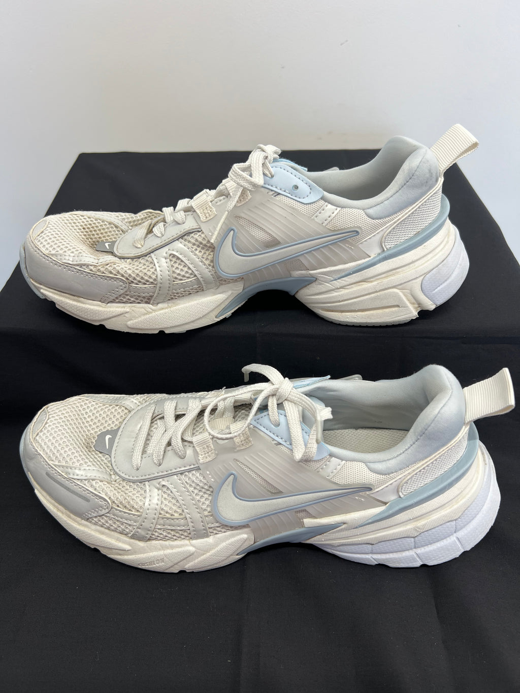 Opposite side view of Nike V2K Run trainers displaying structured overlays and cushioning