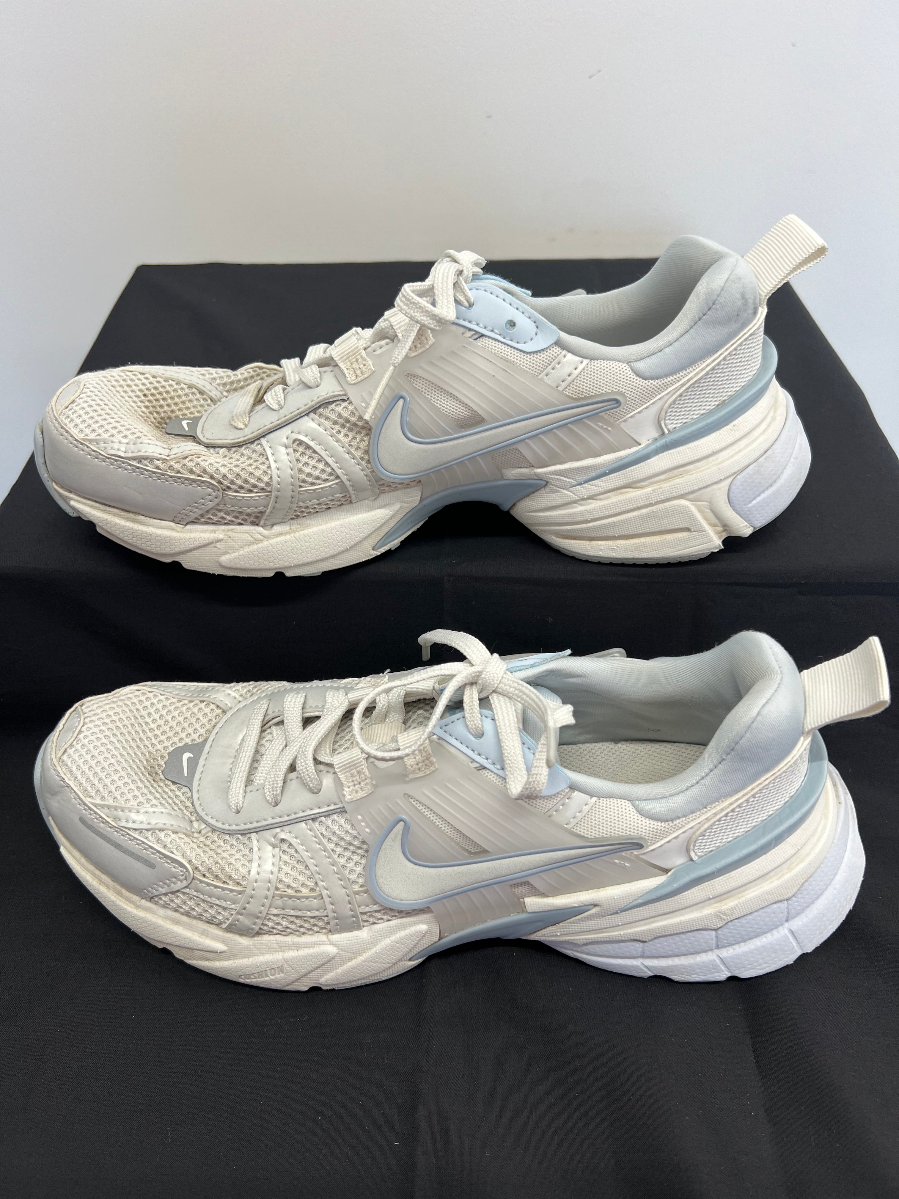 Opposite side view of Nike V2K Run trainers displaying structured overlays and cushioning