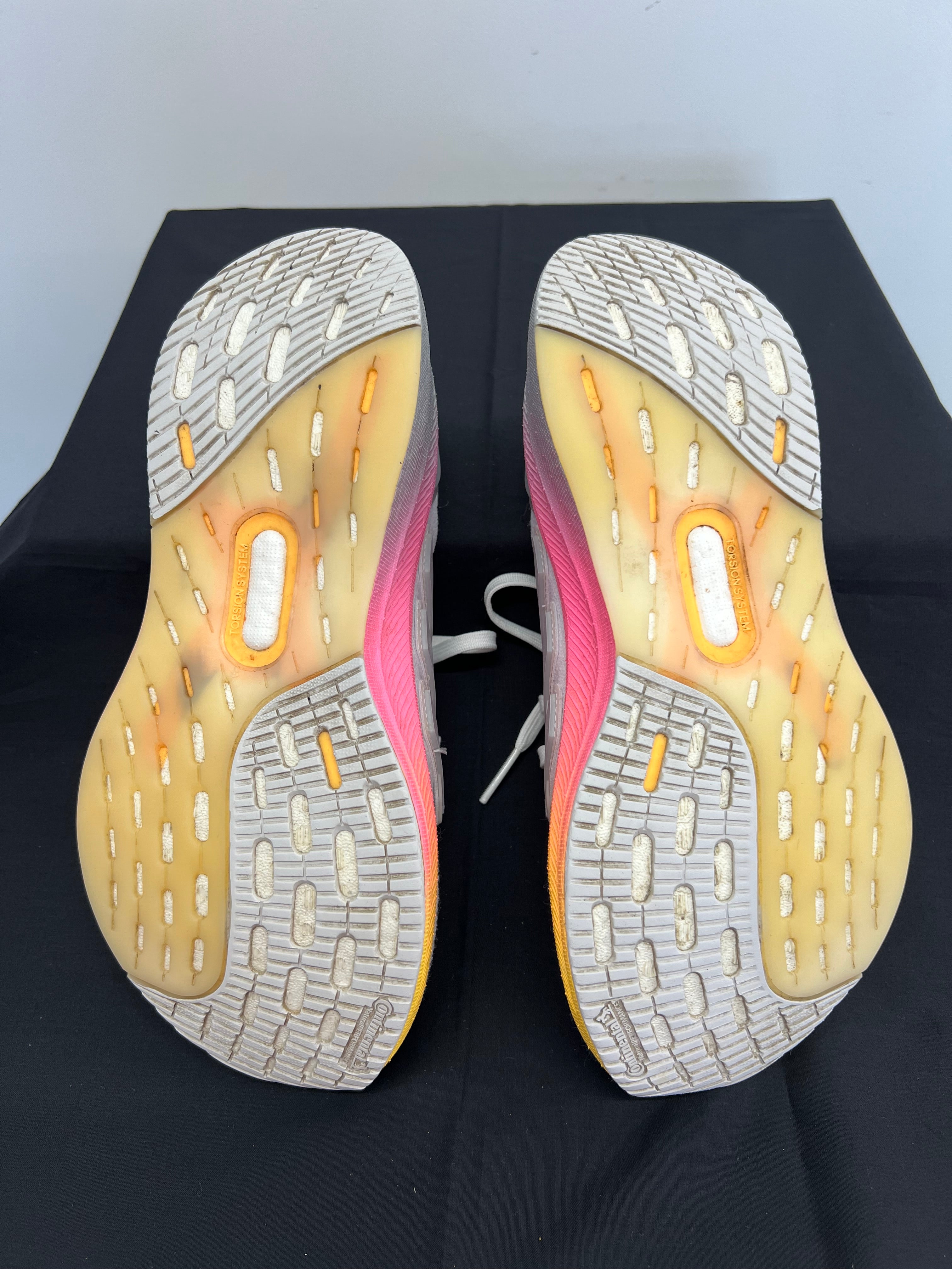 Sole view of adidas Ultra Boost trainers showing Continental rubber tread and Torsion System