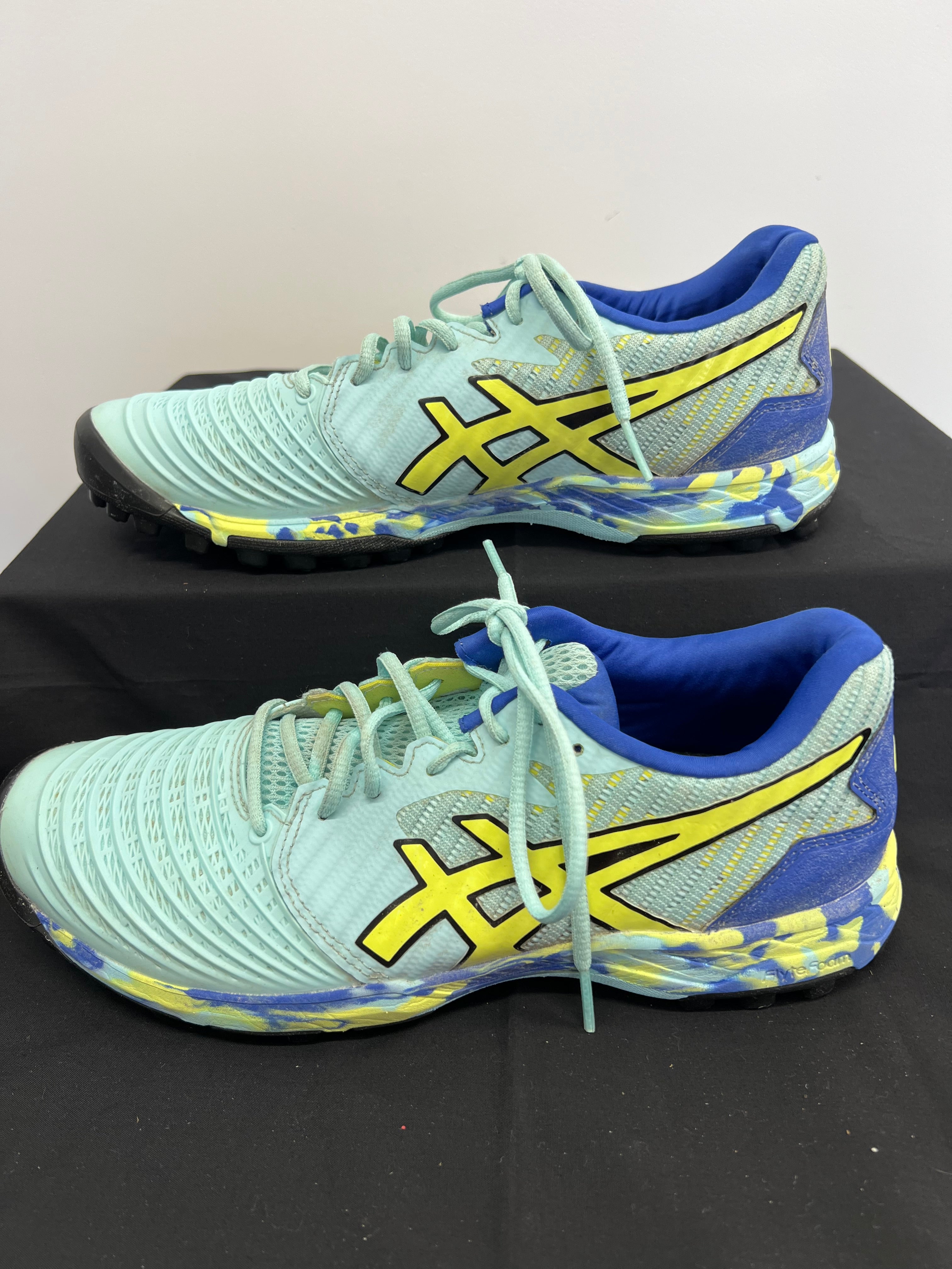 Opposite side view showing detailed upper texture and heel logo