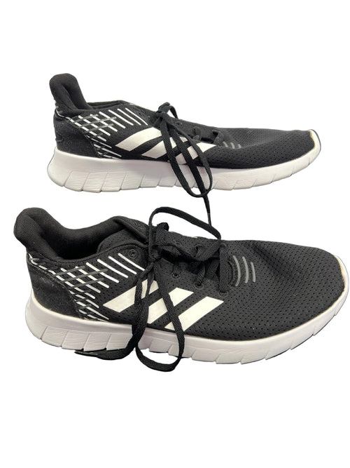 Side view of Adidas Asweerun running trainer showing breathable mesh upper and flexible white sole