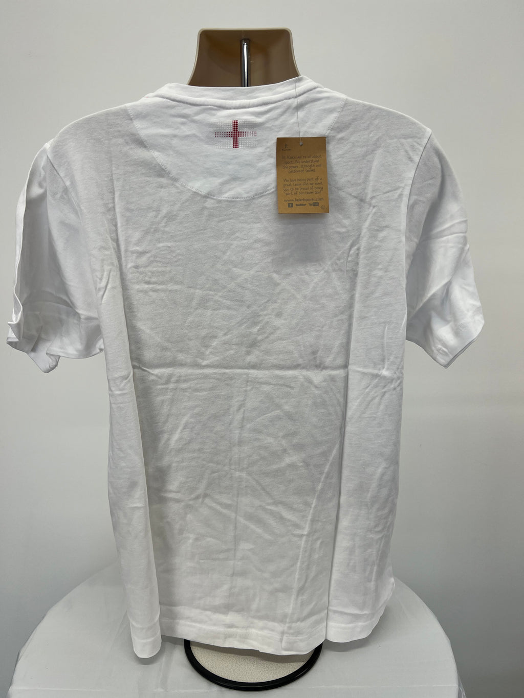 Back view of white Kukri England Commonwealth Games t-shirt showing small England flag and hanging tag