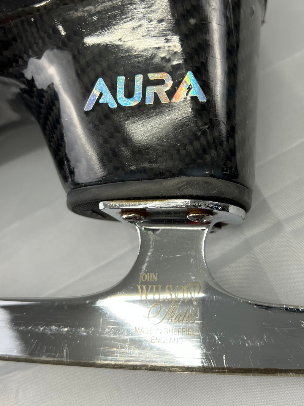 Top view of Aura figure skating boots with lace details and padded interior