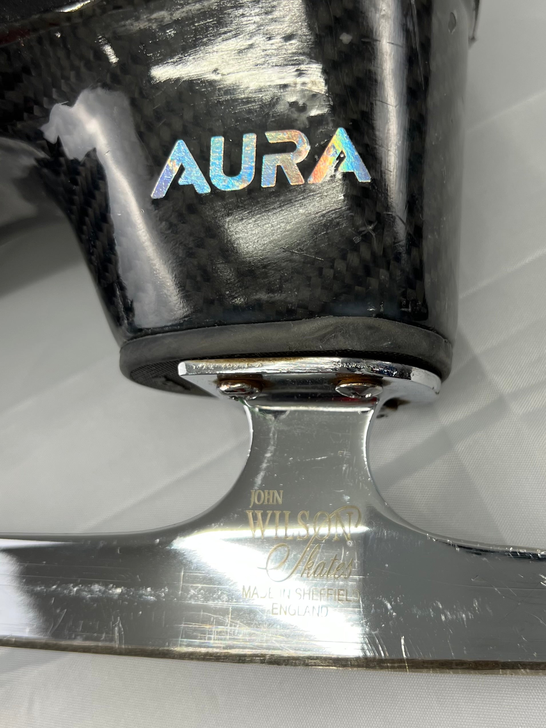 Top view of Aura figure skating boots with lace details and padded interior