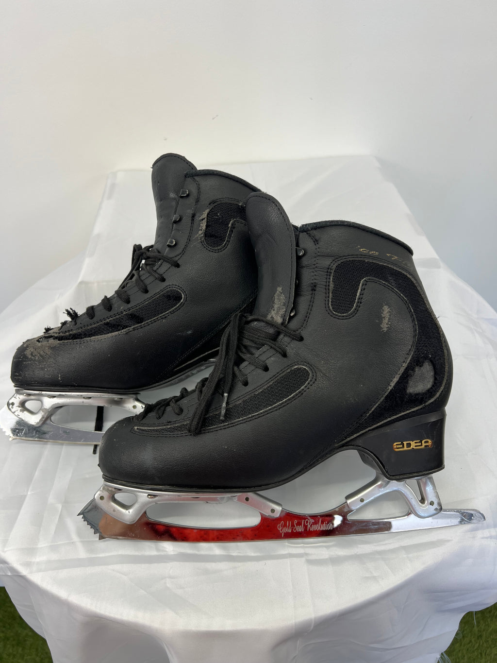 Side view of EDEA Ice Fly skates highlighting Gold Seal Revolution blades and mesh panel details