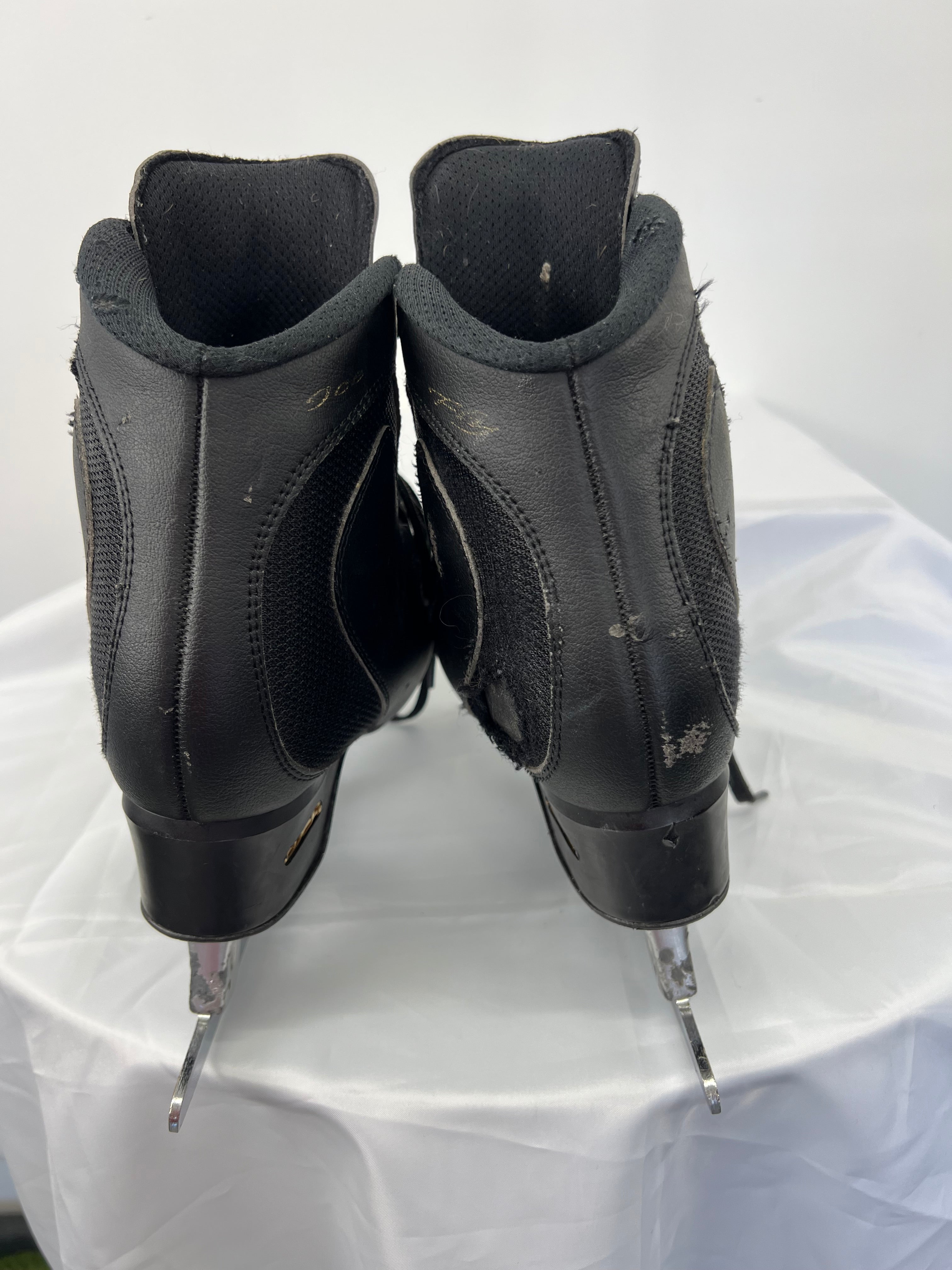 Rear view of EDEA Ice Fly skates showing padded ankle collars and heel with EDEA branding