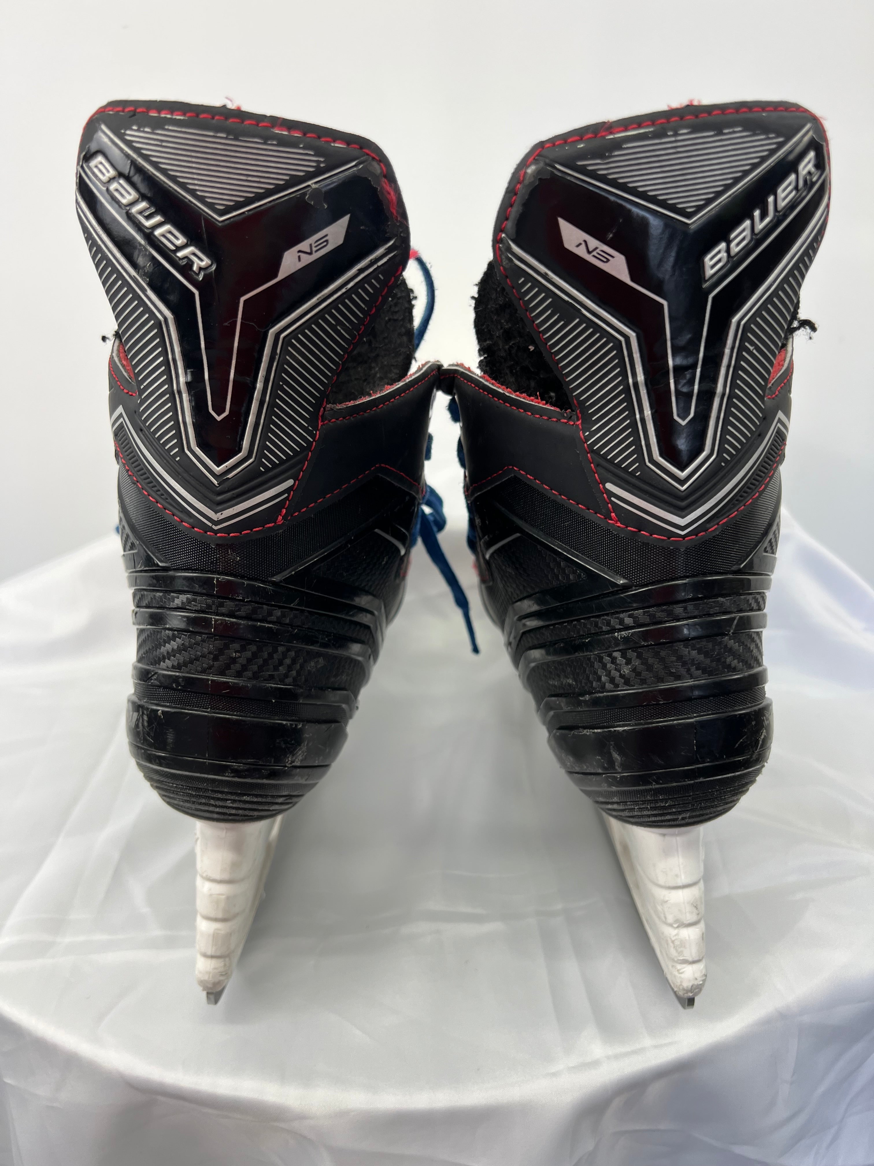 Rear view of Bauer Light Speed 11 Pro ice hockey skates highlighting padded black and red collars