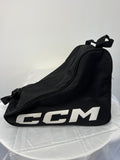 Black CCM ice skate bag side view on white surface