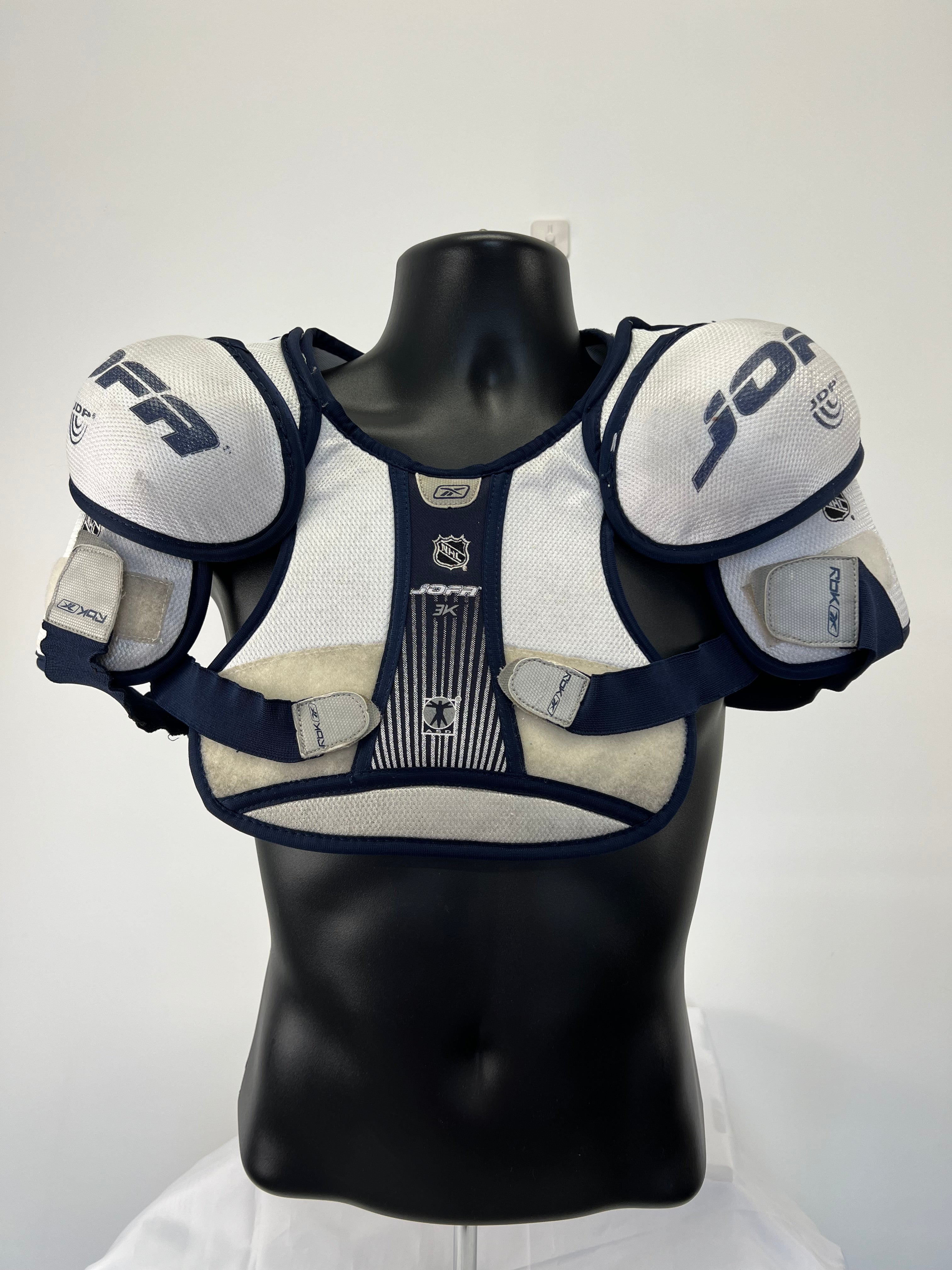 JOFA NHL White Shield Series ice hockey shoulder pads for juniors front view on mannequin