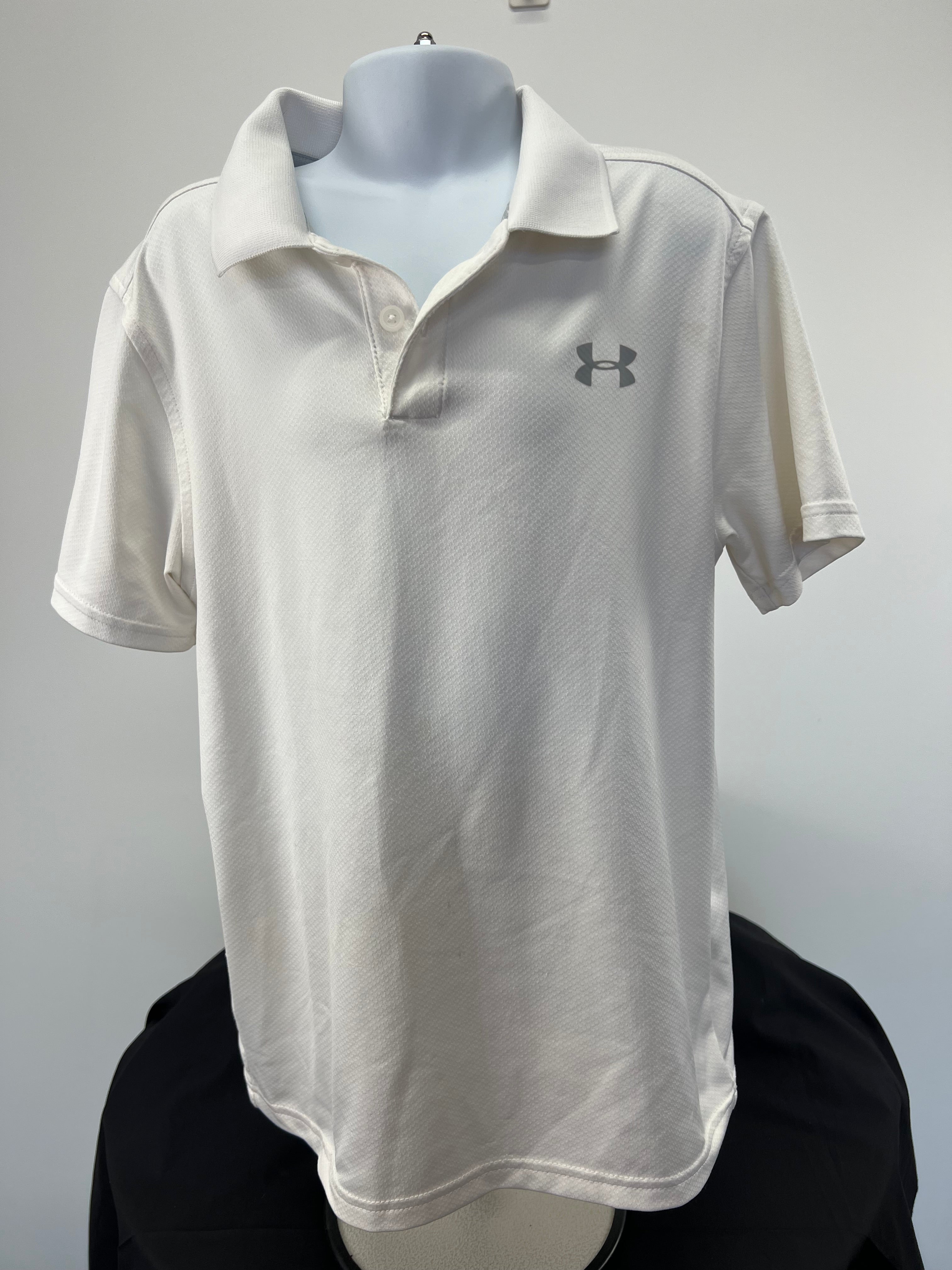 Front view of white Under Armour youth polo shirt with logo on chest