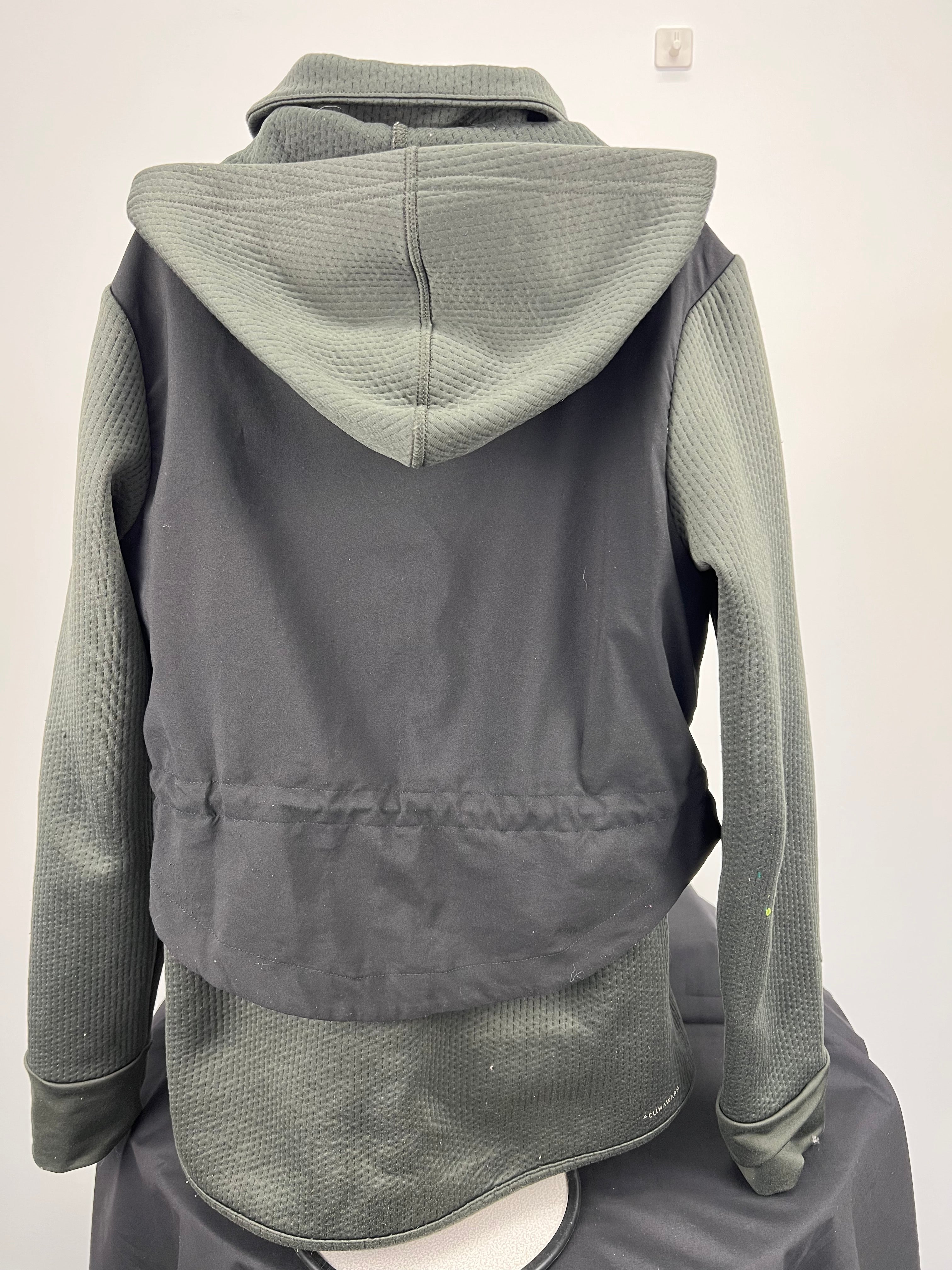Back view of Adidas Kids Climawarm jacket showing hood and fabric texture
