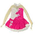 Front view of pink and cream long sleeve embellished kids ice skating dress with floral rhinestones and ruffled skirt