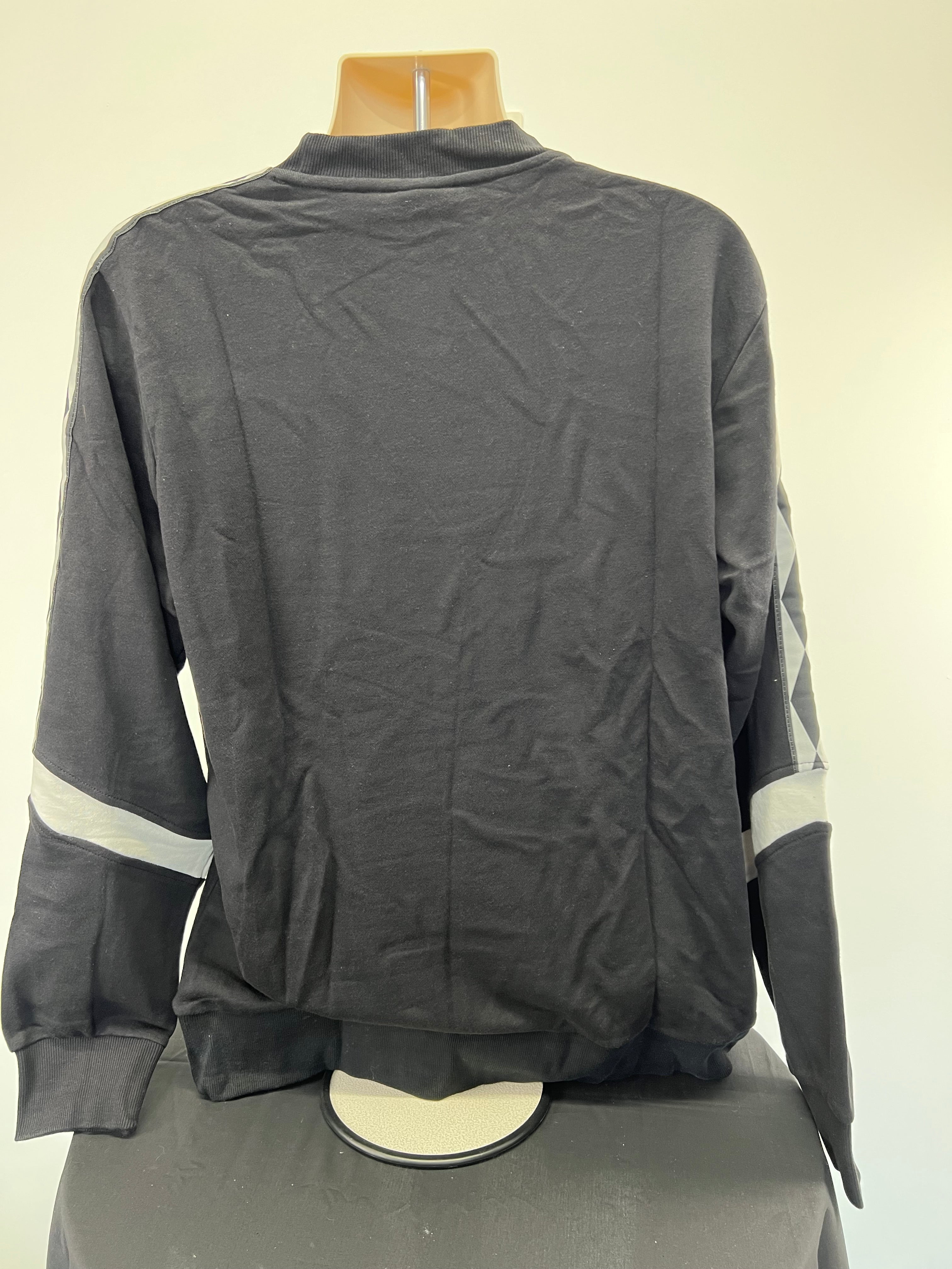 Back view of Umbro black sweatshirt showing plain design and ribbed hem
