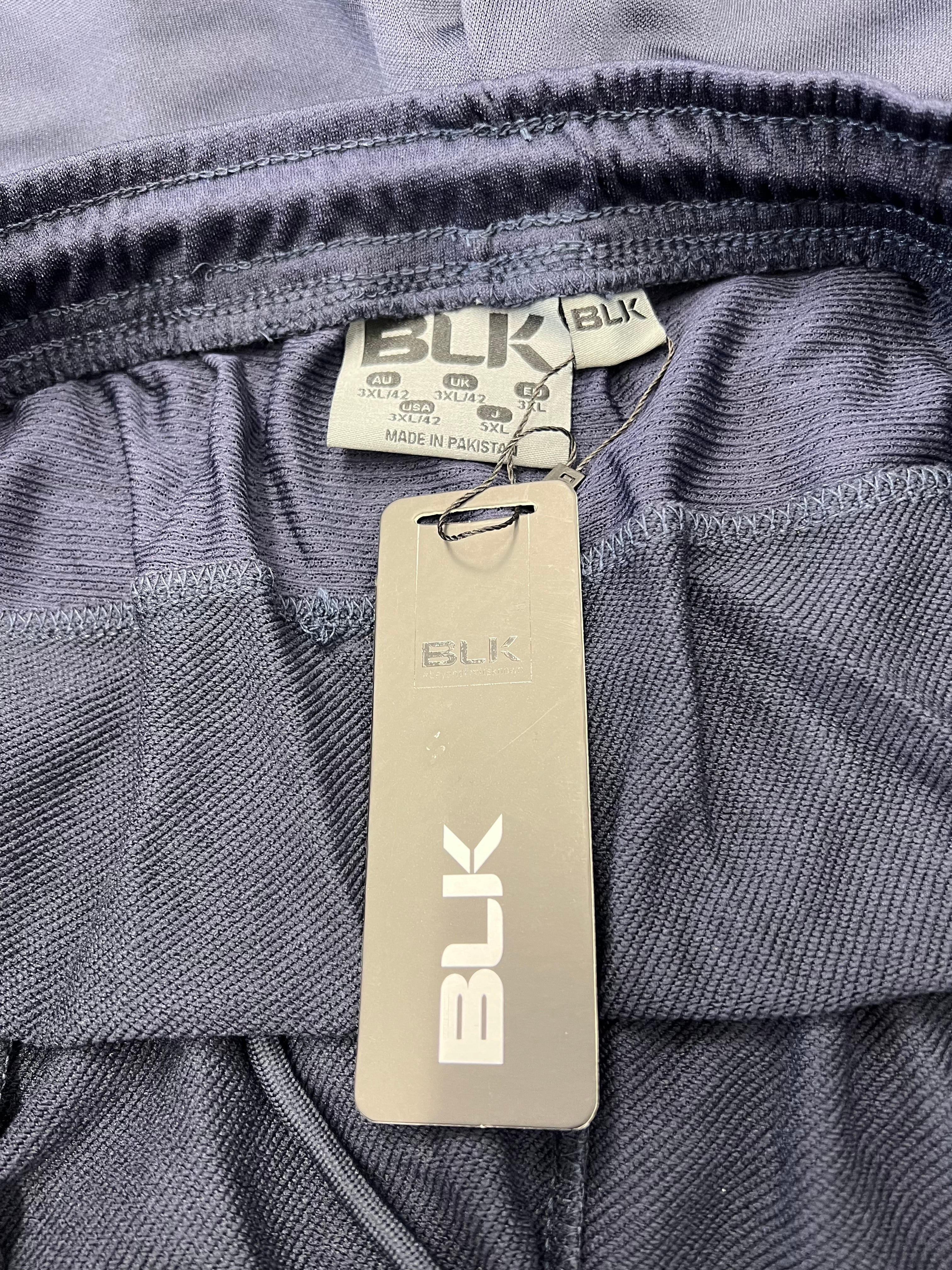 Close-up of BLK brand label and elastic waistband inside London Irish tracksuit trousers