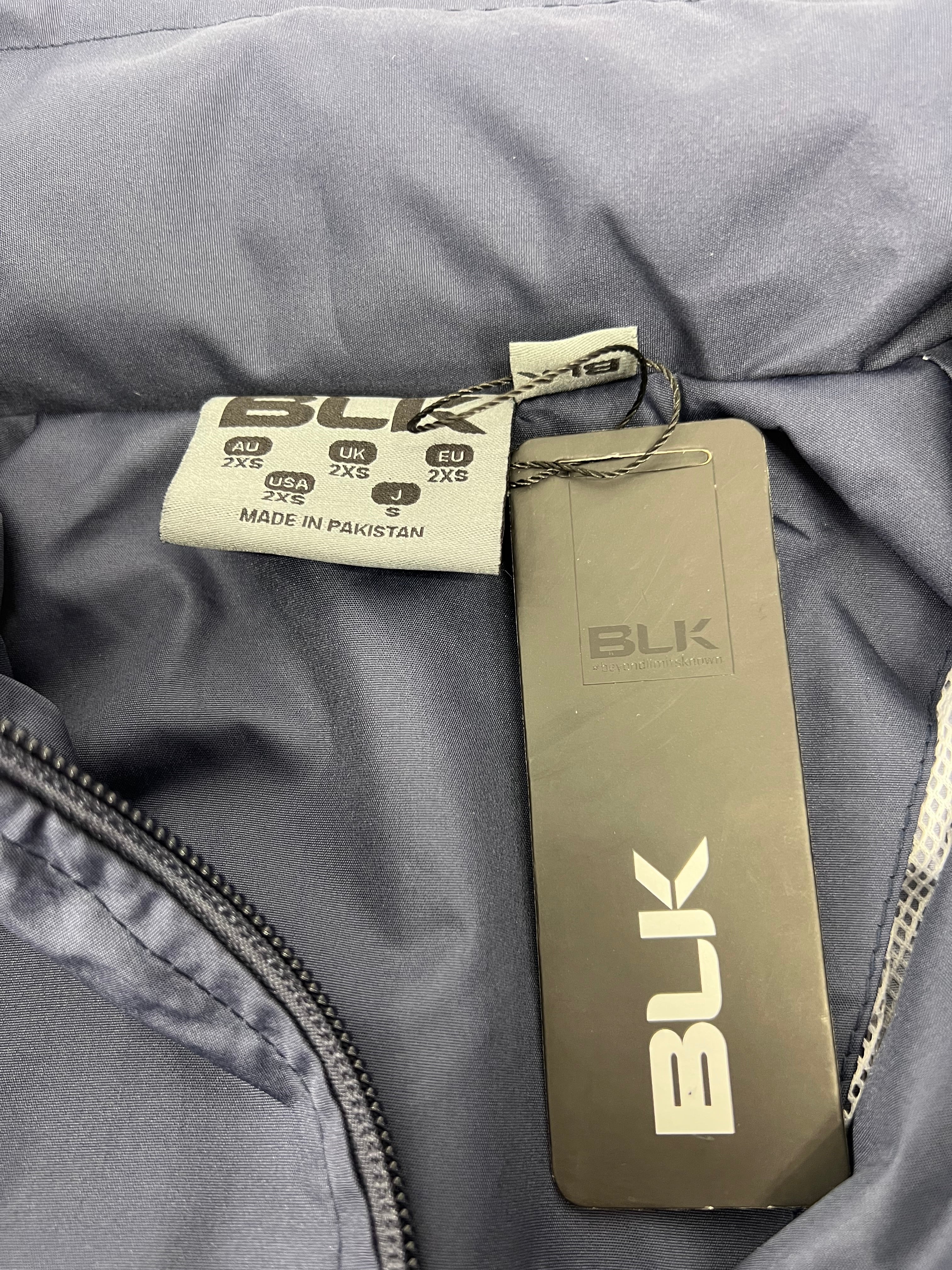Close-up of inner label showing BLK brand and size 2XS on Youth London Irish lightweight jacket