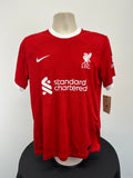 Front view of Liverpool FC men's home football jersey in red with white collar and sleeve trim