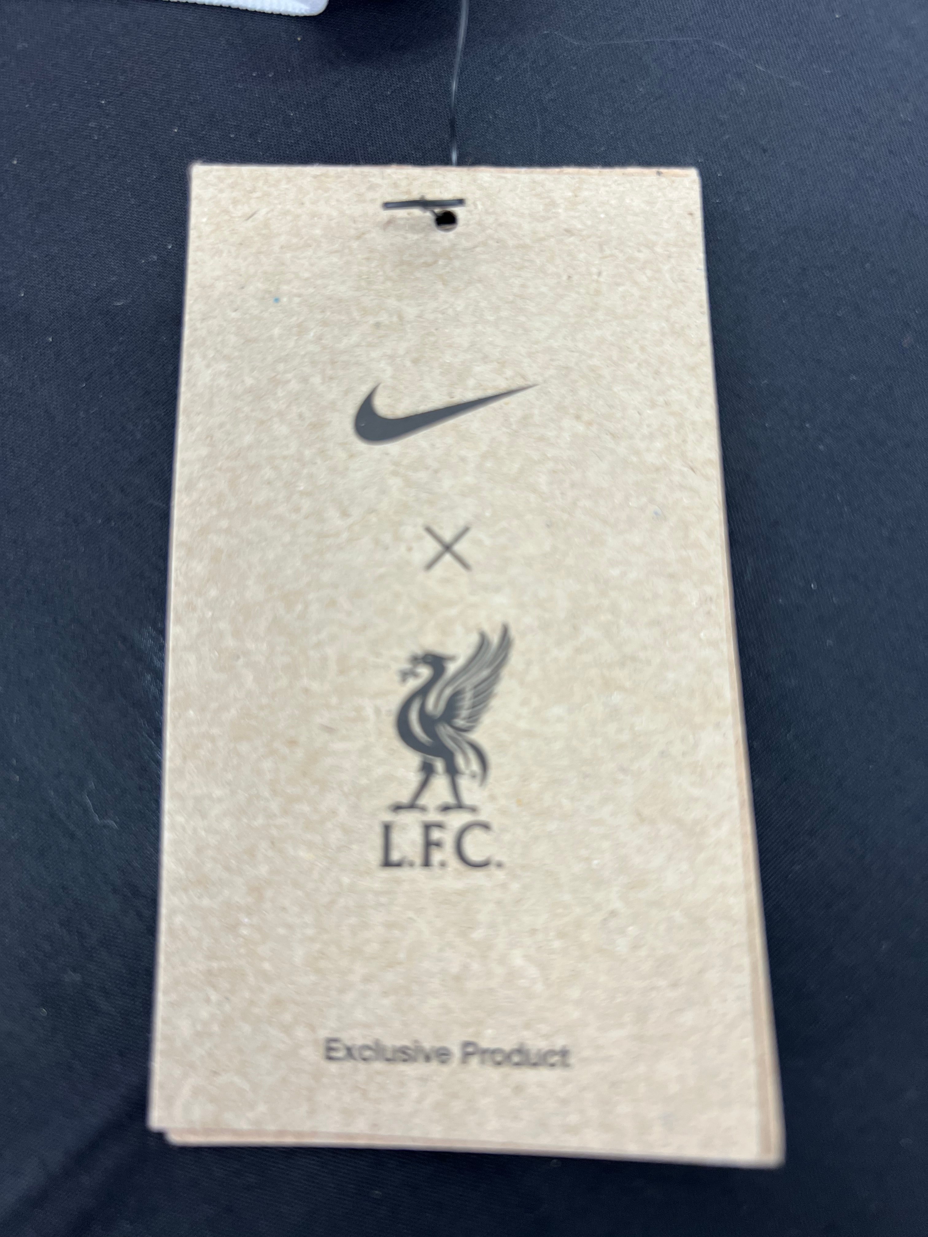 Tag on Liverpool FC Nike jersey that reads exclusive product