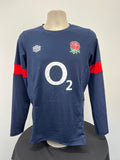 Front view of navy and red Umbro England rugby training long sleeve top with England rose and O2 logos