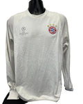 Front view of Adidas FC Bayern Munich white long sleeve top with UEFA Champions League and team logos