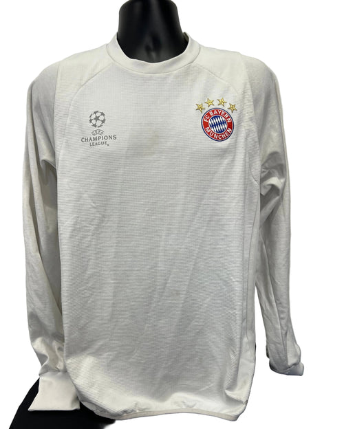 Front view of Adidas FC Bayern Munich white long sleeve top with UEFA Champions League and team logos