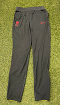 Front view of black Liverpool FC Nike Dri-FIT ADV training pants with red accents