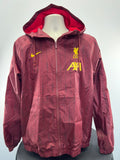 Front view of Liverpool FC lightweight training jacket in red with yellow logos and hood