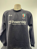 Front view of London Irish BLK rugby sweatshirt with team and sponsor logos