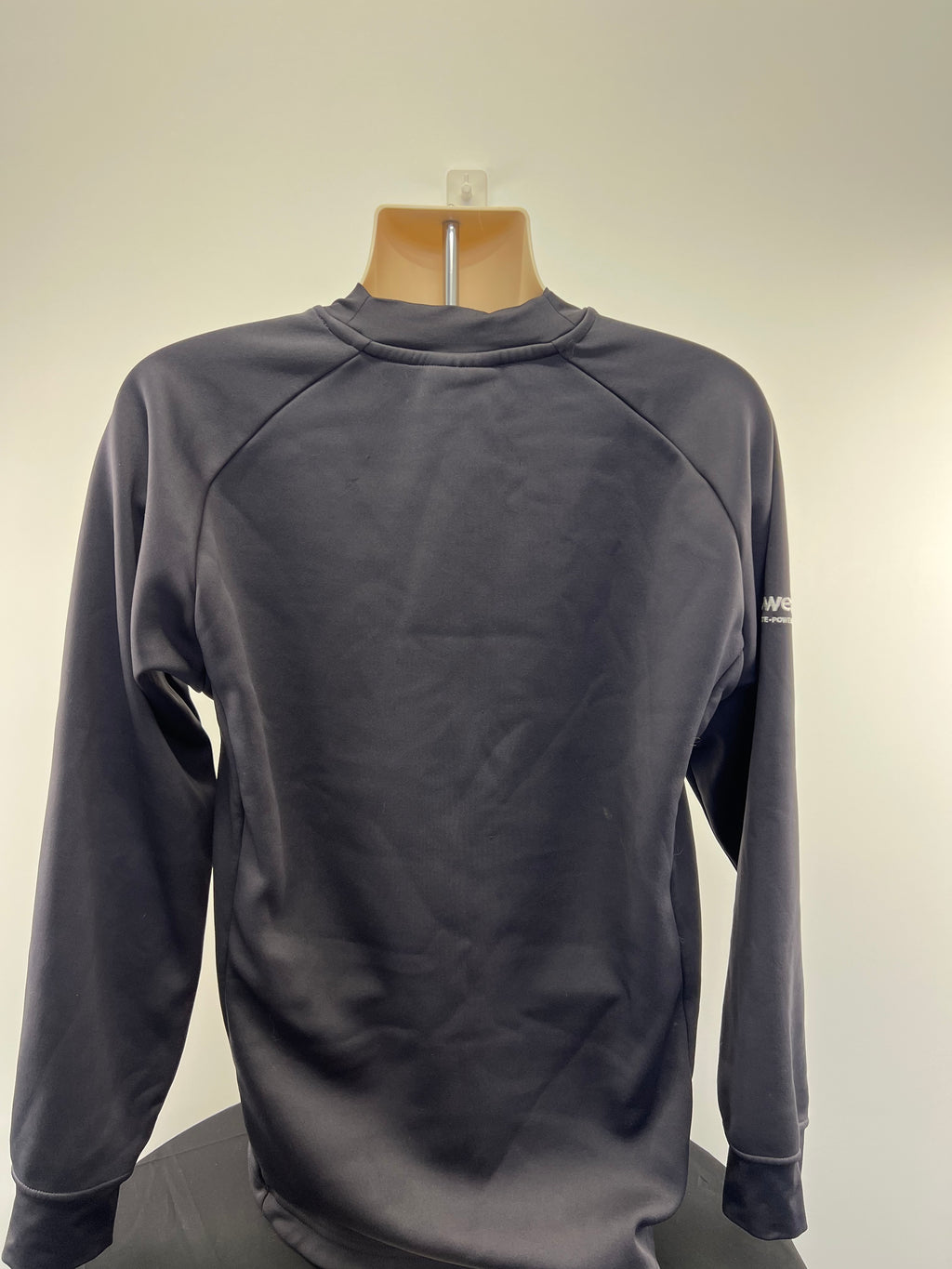 Back view of dark London Irish rugby sweatshirt showing simple long sleeve design