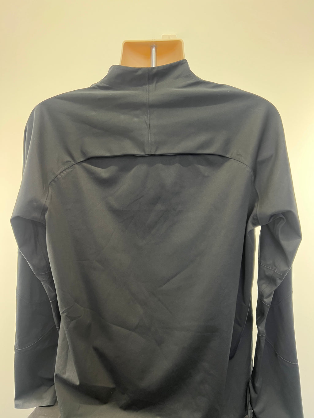 Back view of black Liverpool FC Nike long sleeve top showing clean, smooth finish and high collar