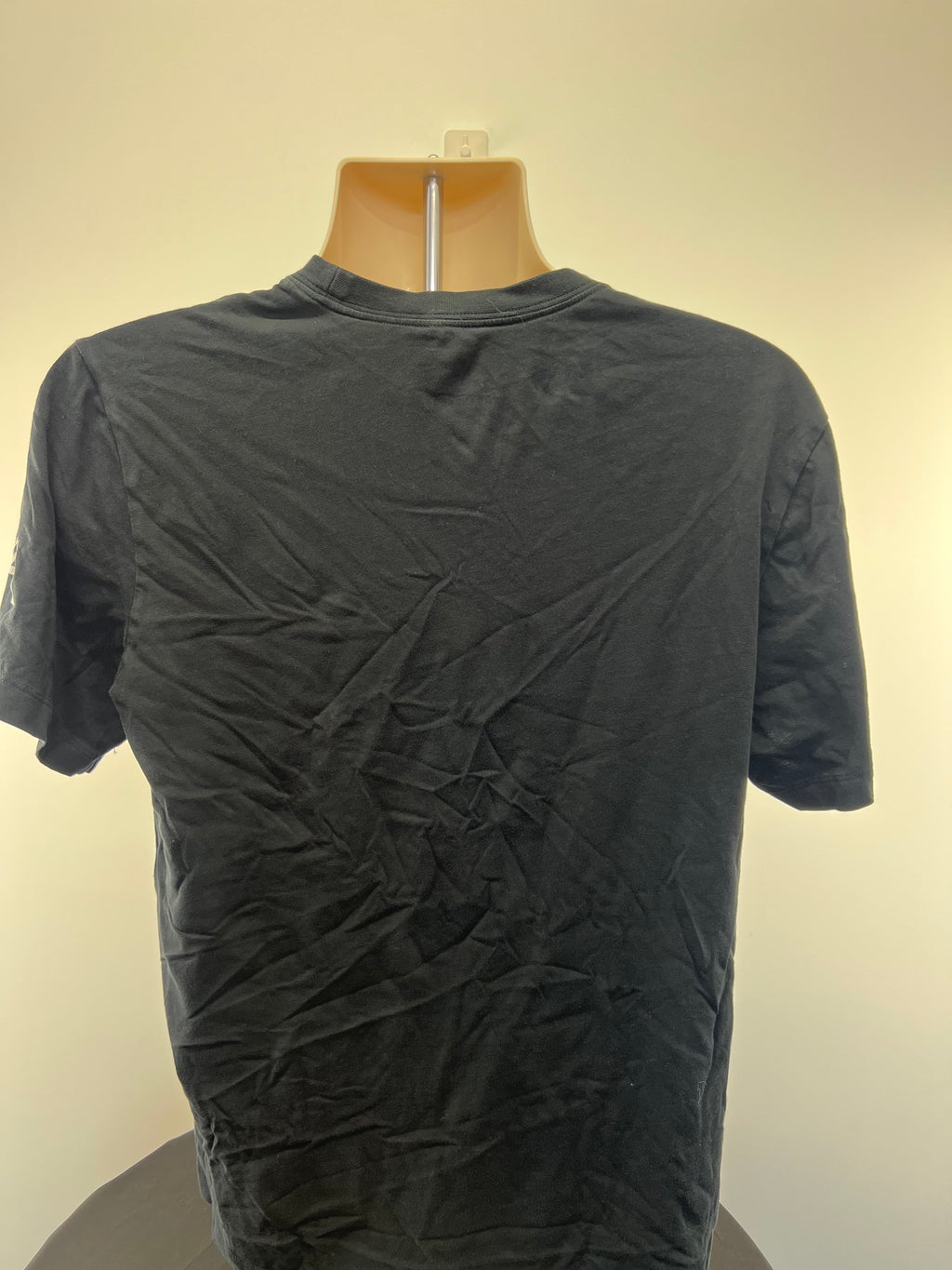 Back view of plain black Liverpool FC Nike T-shirt