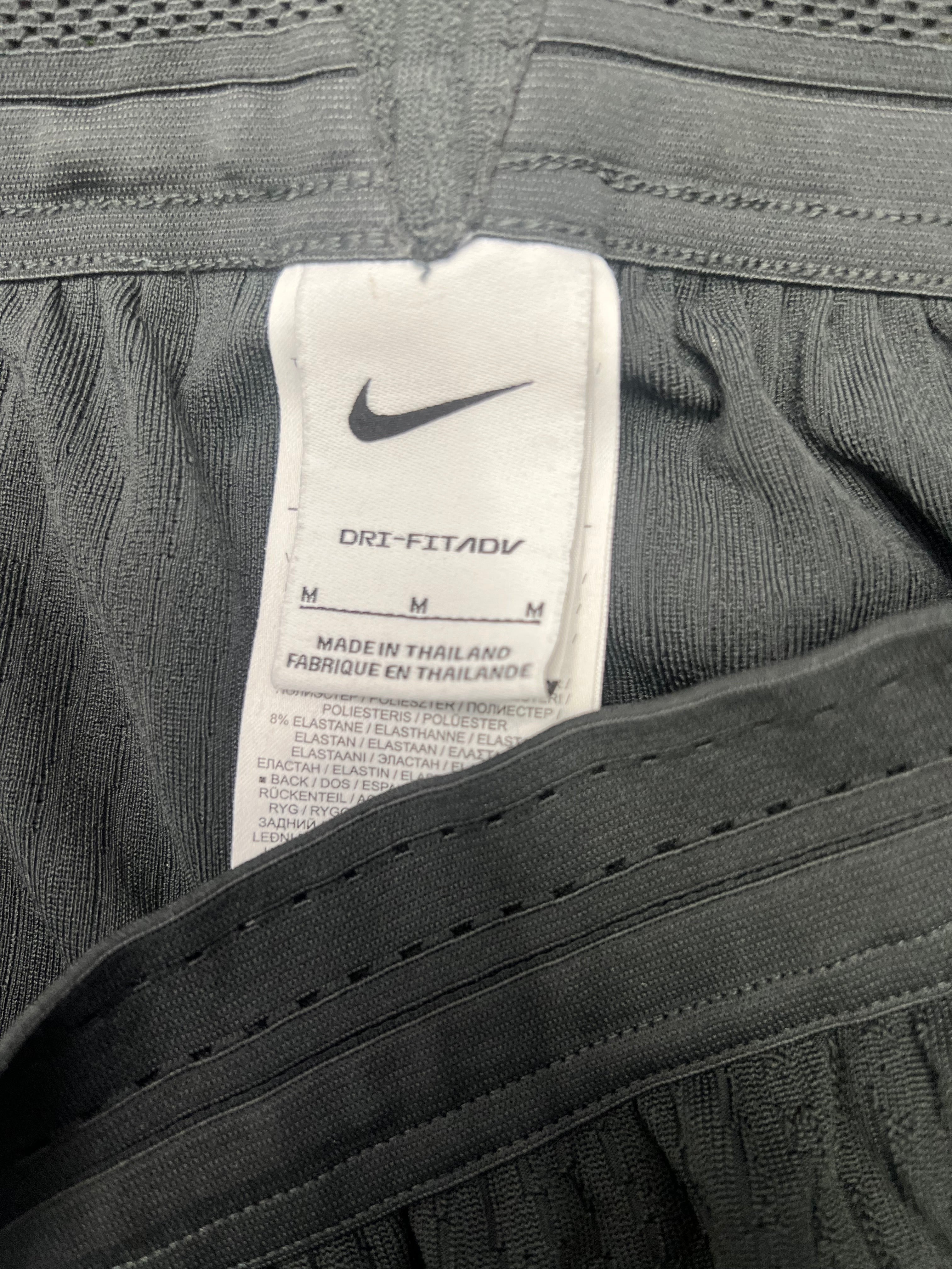 Close-up of Nike Dri-FIT label inside Liverpool FC training bottoms