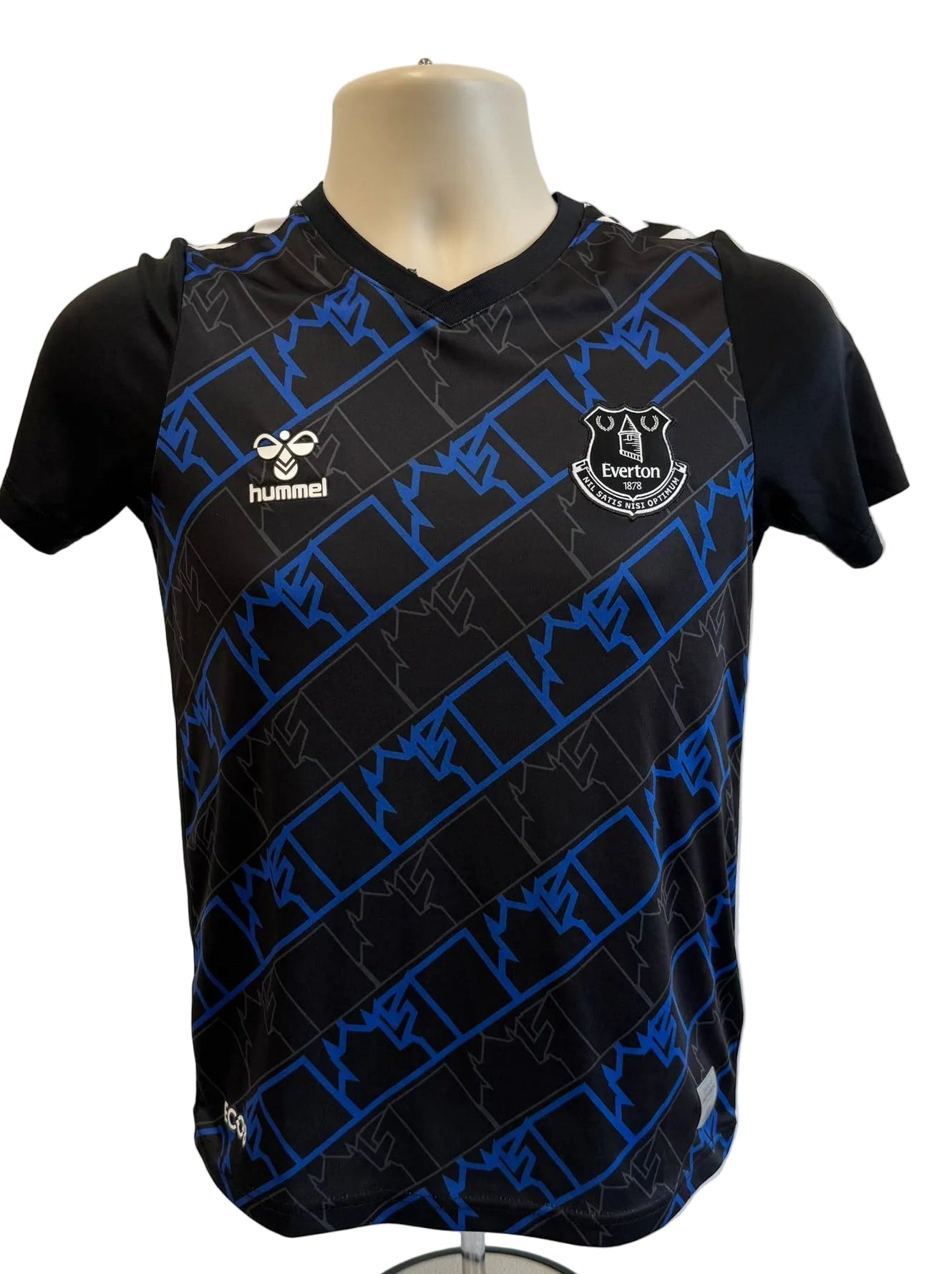 Everton kids football shirt by Hummel with club crest and blue geometric design