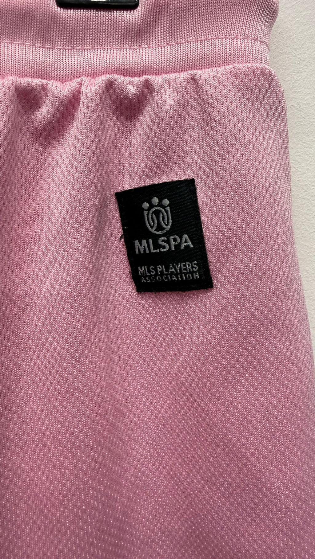 Close-up of official MLS Players Association patch on shorts