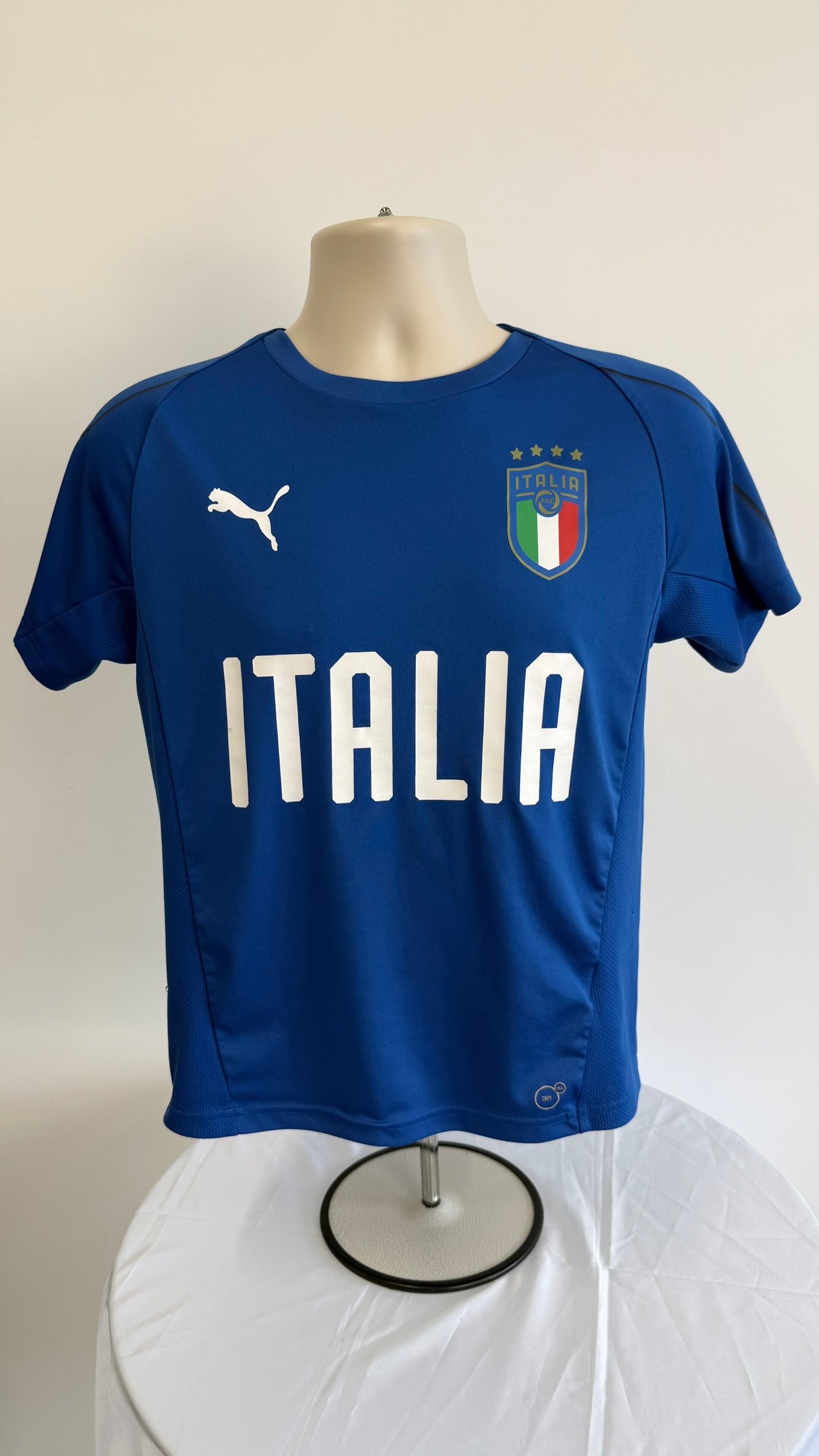 Front view of Puma Italy kids football shirt with crest and Italia text