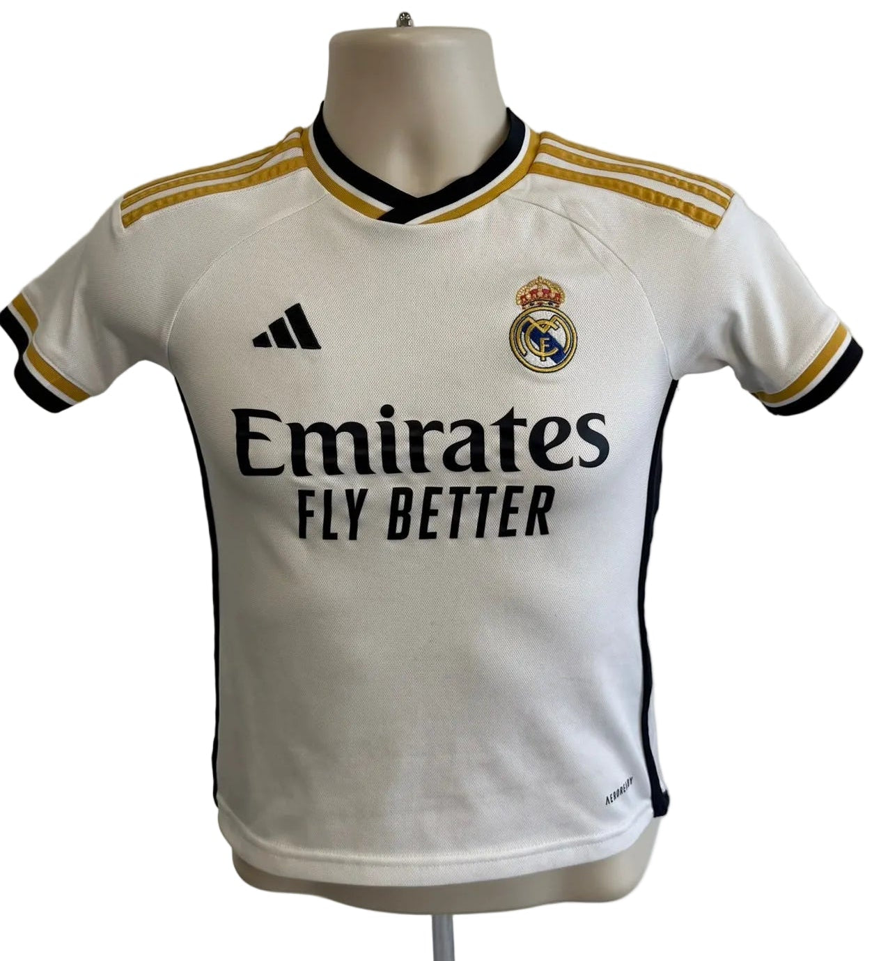 Front of Real Madrid kids football shirt by adidas with crest and sponsor