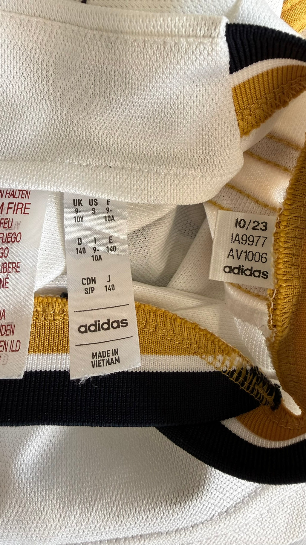adidas size and care label for Real Madrid kids shirt, size 9-10 years