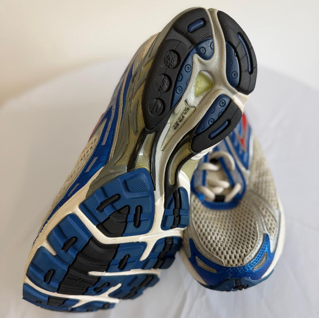 Closeup of Brooks trainers' rubber outsole with grip patterns and mesh upper