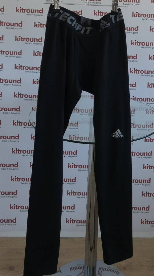 Front view of adidas black Techfit base layer leggings with logo