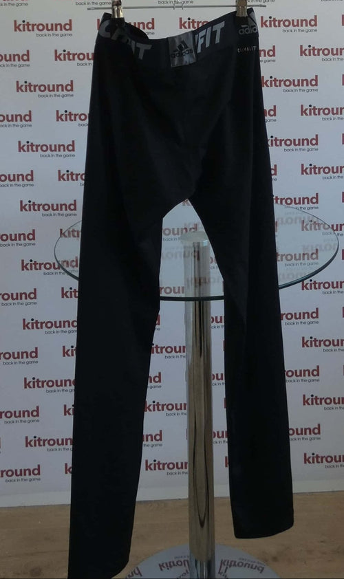 Back view of adidas black Techfit base layer leggings showing waistband