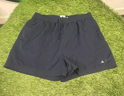 Navy Adidas athletic shorts with drawstring, laid flat