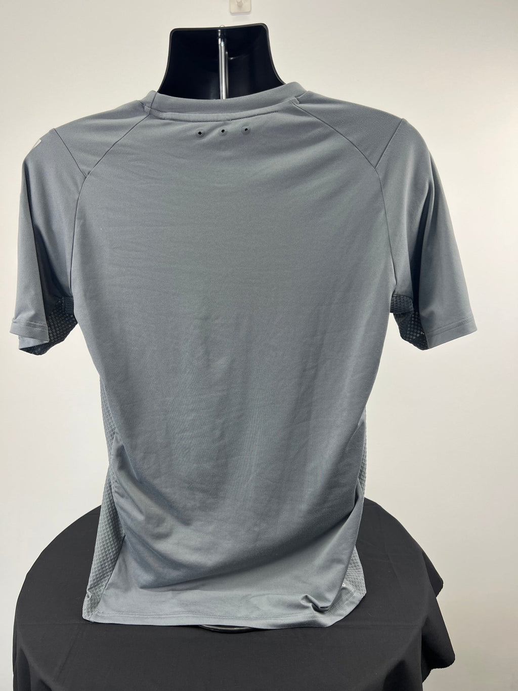 Back view of grey adidas ClimaCool t-shirt on black mannequin