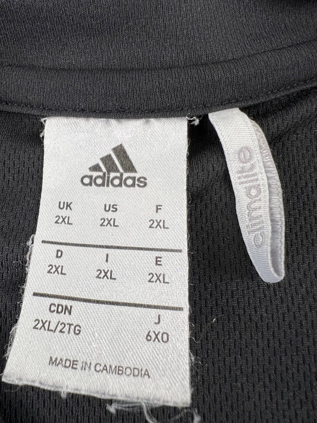 adidas Climalite size tag showing 2XL and material details