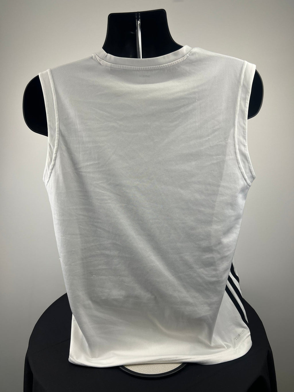Back view of white adidas sleeveless vest top