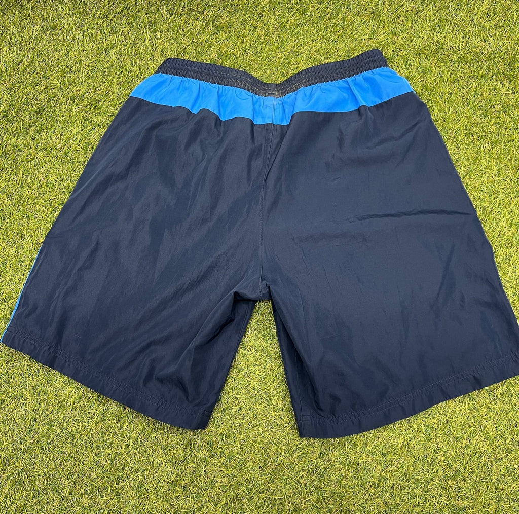 Back view of dark blue adidas sports shorts with blue waistband detail