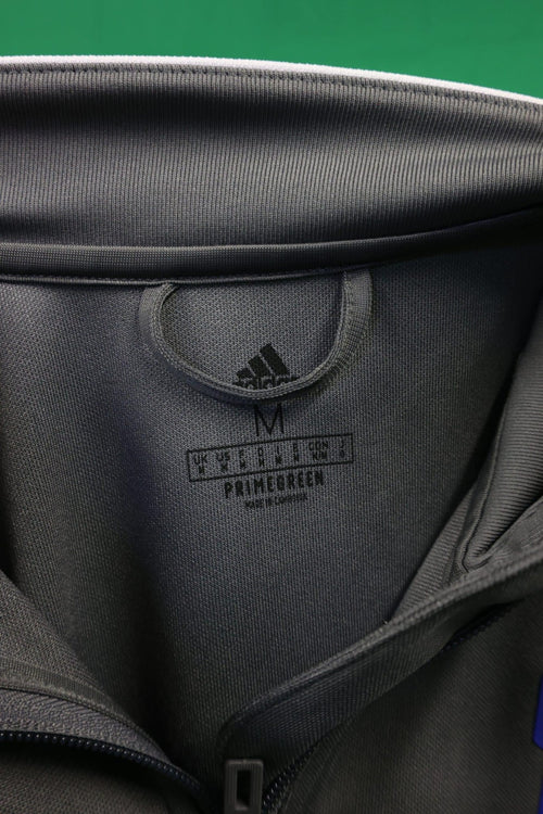 Close-up of inside collar showing sizing and Primegreen label on Adidas Ipswich Town training top