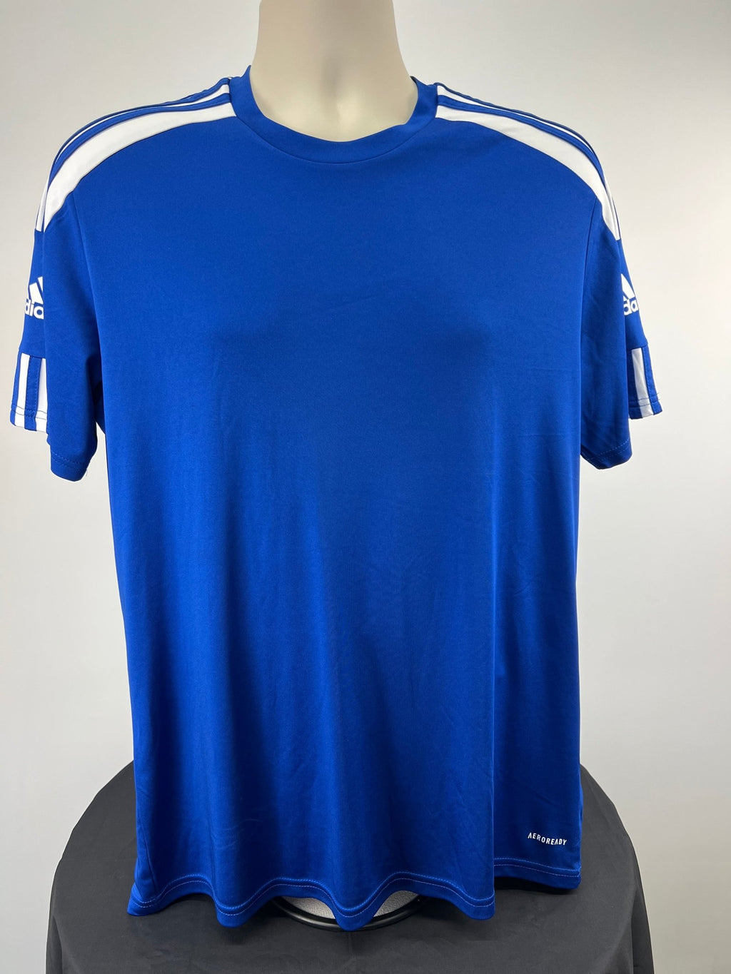 Front view of blue adidas slim fit T-shirt with white stripes, size L.